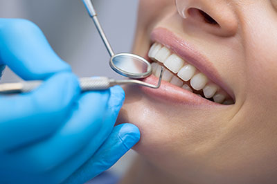 Amaltas Dental   Implant Center | Dental Cleanings, Dentures and Night Guards