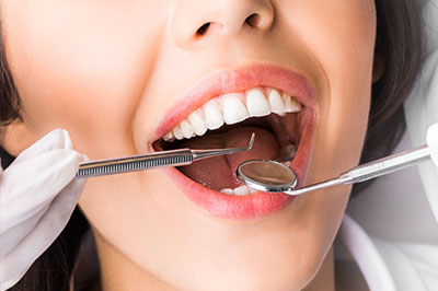 Amaltas Dental   Implant Center | Teeth Whitening, Oral Exams and Oral Cancer Screening